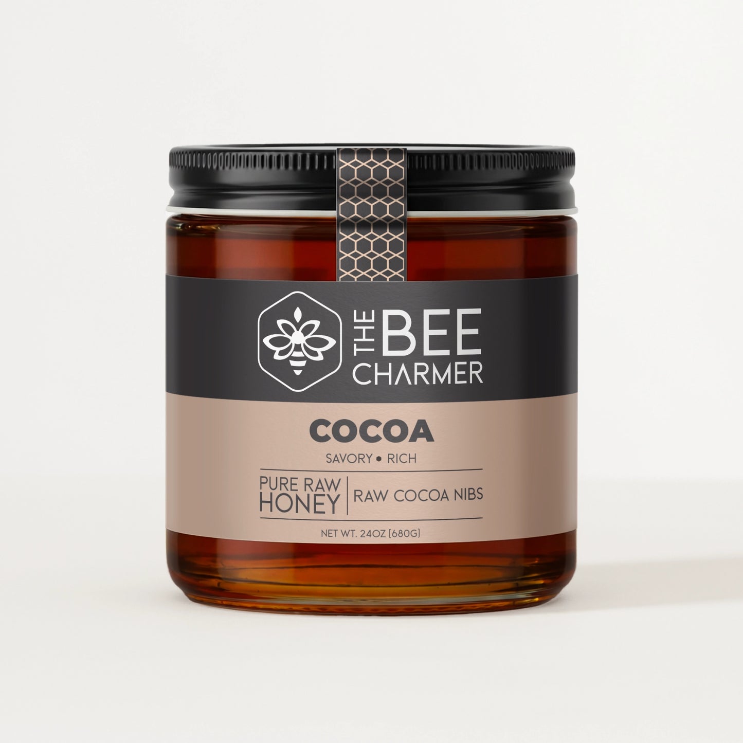 Cocoa Honey in a signature Bee Charmer branded 24oz wide-mouth glass jar.  This is our largest available size.
