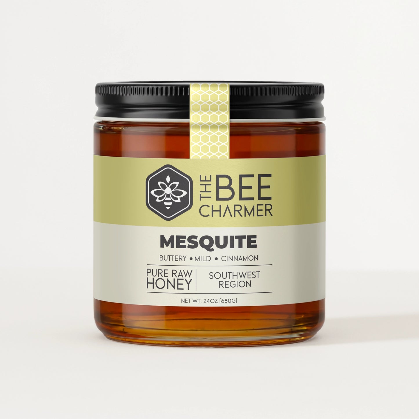 Pure raw Desert Mesquite Honey in a signature Bee Charmer branded 24oz wide-mouth glass jar.  This is our largest available size.
