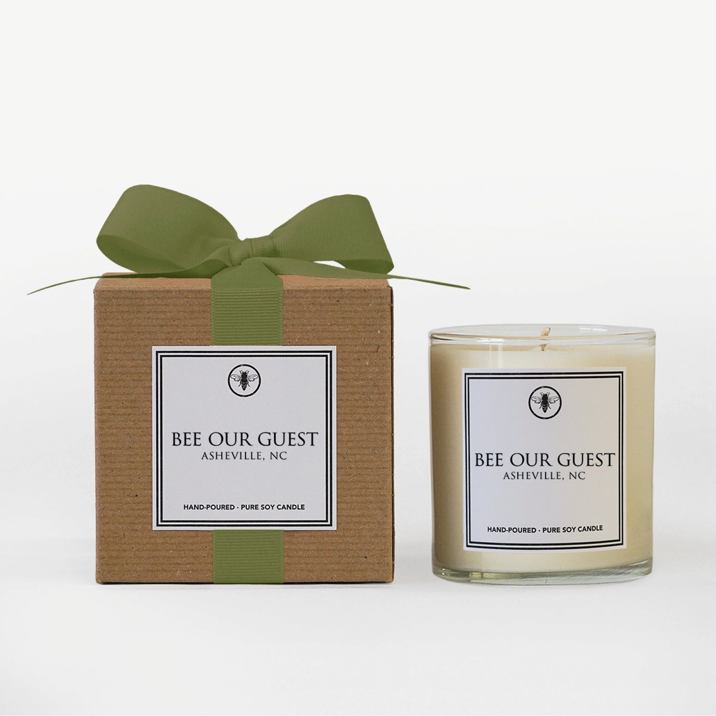 A large, hand-poured, pure soy candle with a “Bee Our Guest” inspirational message by The Bee Charmer