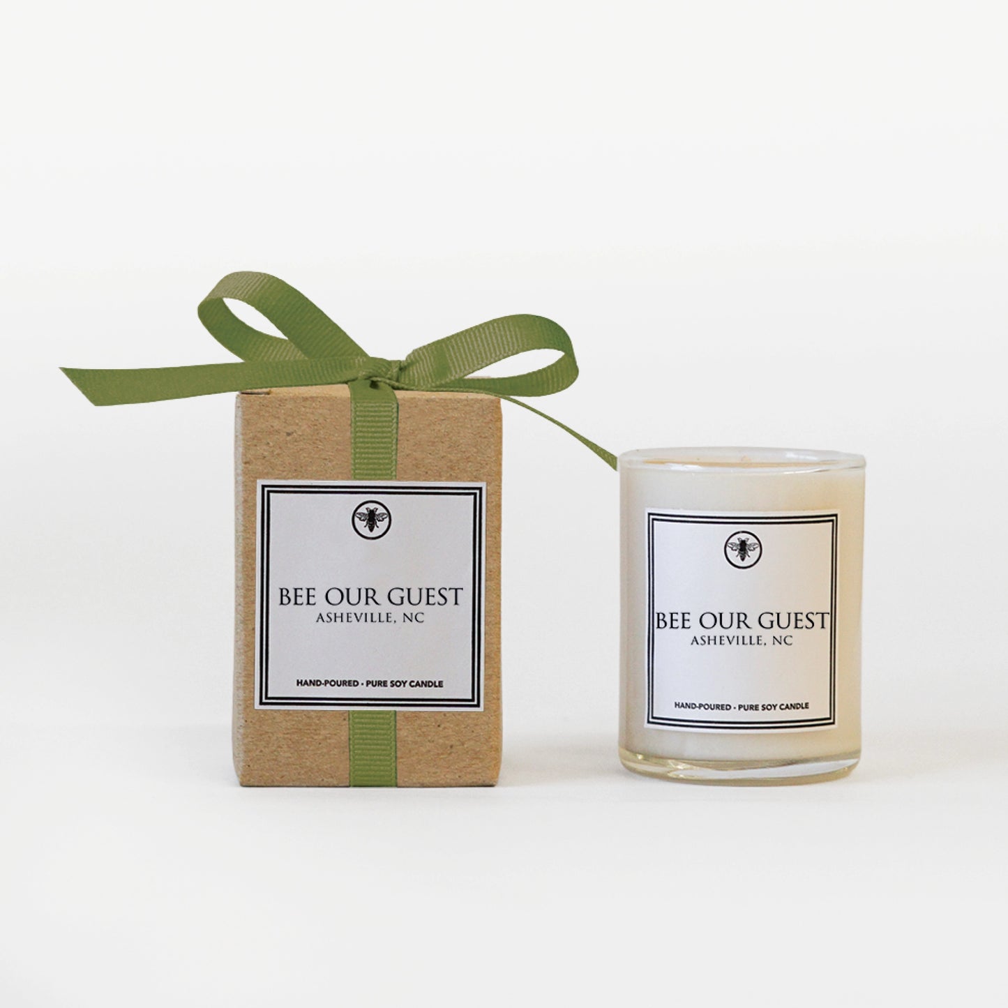 A small, hand-poured, pure soy candle with a “Bee Our Guest” inspirational message by The Bee Charmer