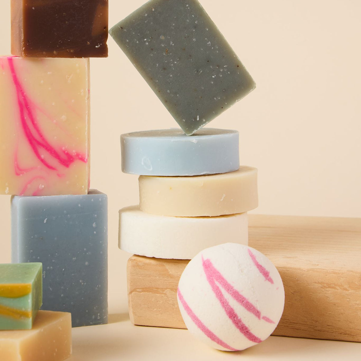 The Bee Charmer bath and body: bar soaps, shampoo and conditioner bars and a fizzing bath bomb