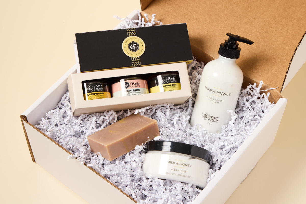 Honey & Body Care Gift Set: three jars of raw honey with Milk and Honey bar soap, lotion and cream in a shipping box